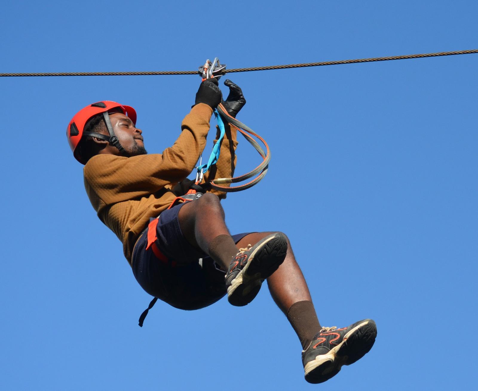 Boy on a zipline on the ranch resort in Polokwane