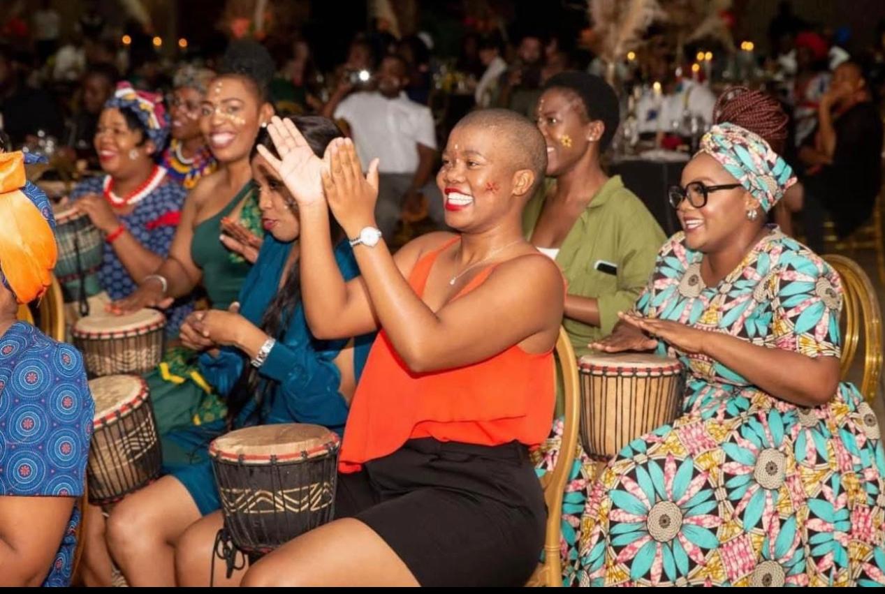 633de31b-a015-4a6f-8442-231b048e98b3 - Copy - Copy.JPG team-building-group-laughter-polokwane.webp Corporate group laughing and engaging during team building session in Polokwane Team Building Activities