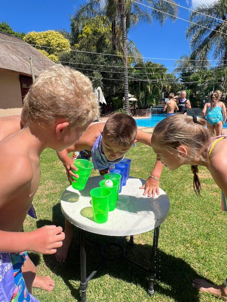 school kids doing agold rush activity on a trip